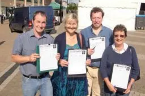 Terrye Teverson collecting signatures on Lemon Quay with Chris Pascoe, Rob Nolan and Ros Cox