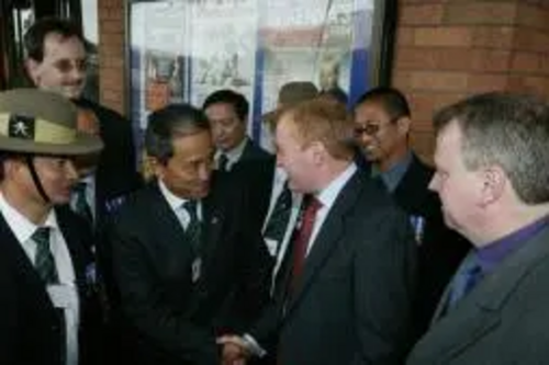 Gurkhas being greeted by Charles Kennedy at Lib Dem Conference in Bournemouth
