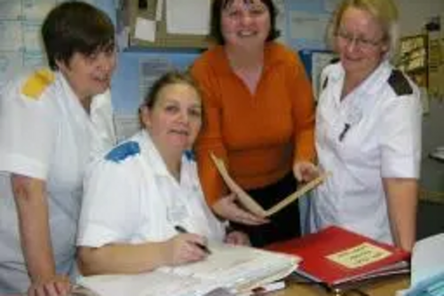 Jacquie Bell with group of hospital nurses