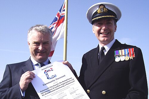 Gerald Vernon Jackson and Sir Tony Radakin sign the Portsmouth Military Covenant in 2012