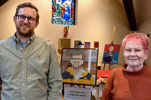 Freddie with local artist Jo and her portrait of him