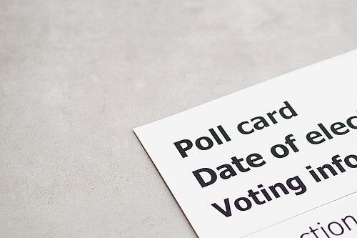 The corner of a poll card for an election