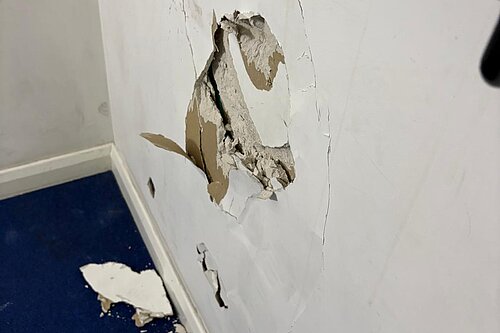 Damage to the walls in Manston Court