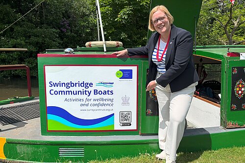 Zöe Franklin next to Swingbridge Community Boats "Maggie G"