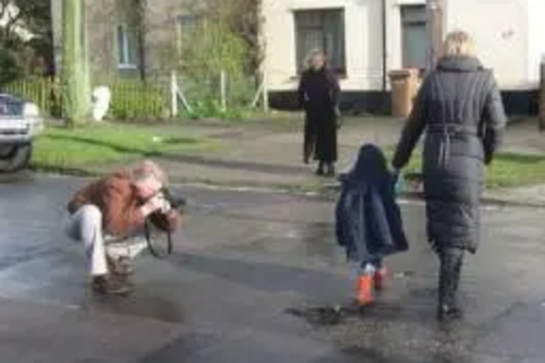 Sunday Times photographer takes picture of Chelmsford residents walking over pothole