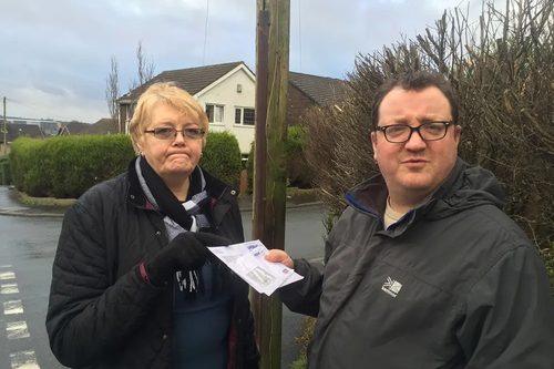 ocal Resident Irene Davidson with Andy Kelly on the Silver Hill Estate at the site of the missing Post Box