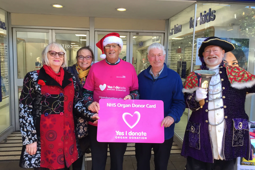 Cllr Steve Gazzard, Eleanor Rylance, Tim Dumper, and the gloriously dressed Exmouth Town Crier.