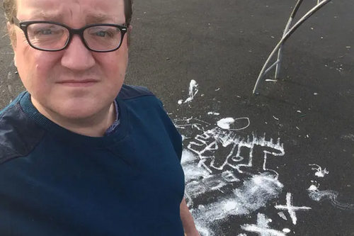Councillor Kelly at the park inspecting the damage