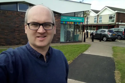 Councillor Michael Headley outside Putnoe Library