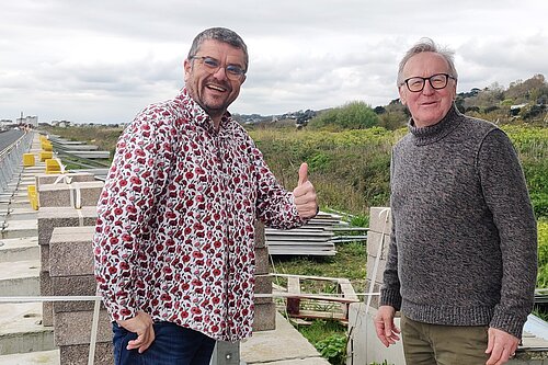 Tim Prater and John Stokes at Princes Parade as the site hoarding is removed