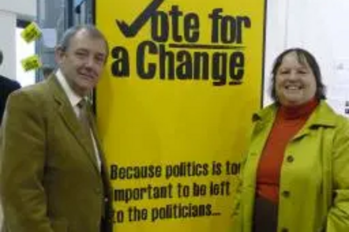 Alan Lewis and Jacquie Bell sign the petition for Fair Votes