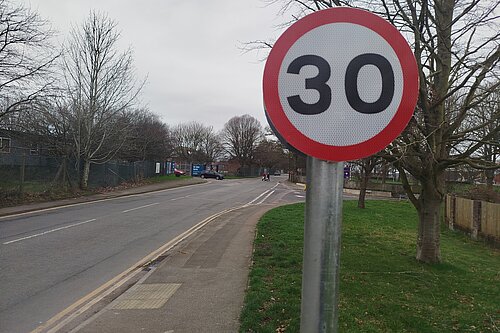30 mph repeater sign on post