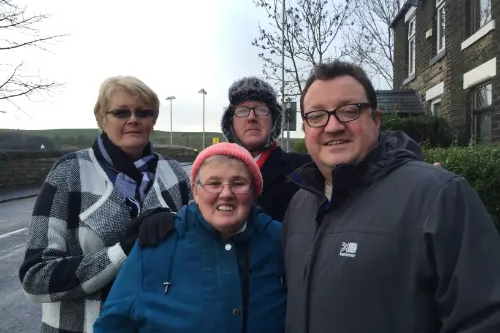 Councillors Andy Kelly and Irene Davidson with local pensioners in Newhey