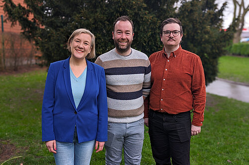 Cllr Jake Austin; Cllr Mark Roberts, leader of Stockport Council; and Lisa Smart MP