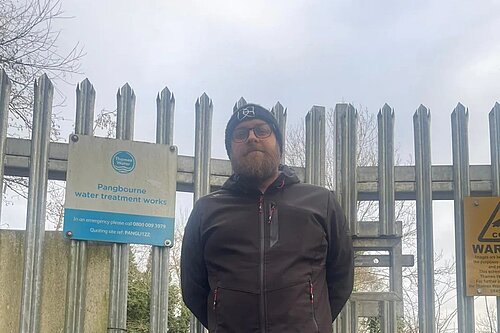 Cllr James Moore outside Thames Water treatment works.