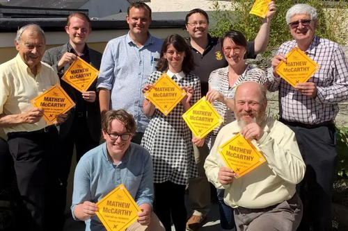 Mathew with election volunteers on polling day