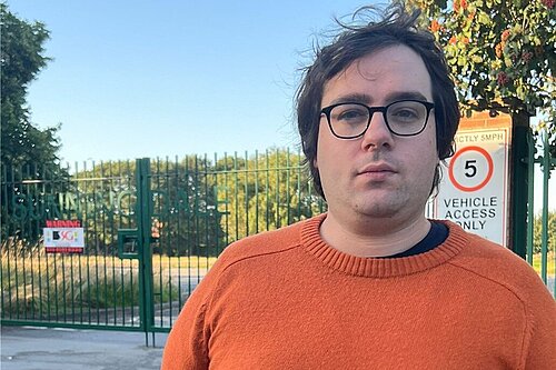 Paul Edgeworth in front of Sunningdale School gates, Springwell