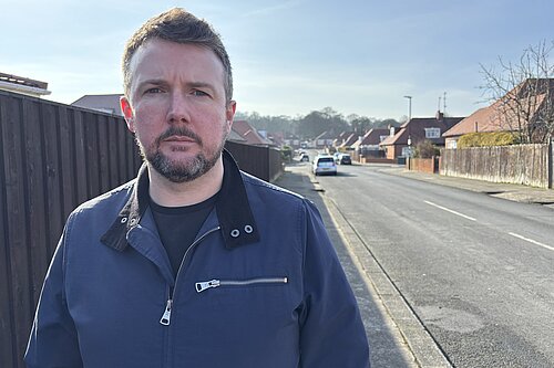 Martin Haswell looking into the camera on a Sunderland street