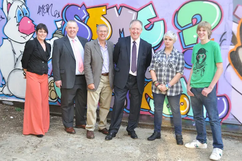 Meeting members of the Vison Youth Cafe in front of their legal graffiti wall
