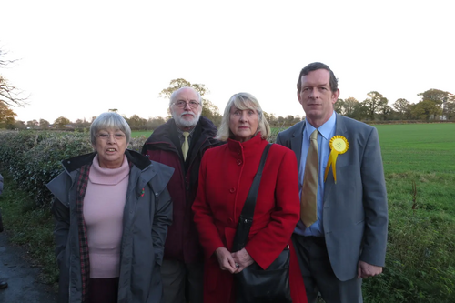 Baroness Joan Walmsley (in red) at the Ashlawn Road Development site with Rugby Liberal Democrats