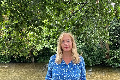 Liz Jarvis MP stood in front of the River Itchen