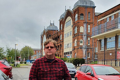 Arran Angus outside Whipps Cross Hospital