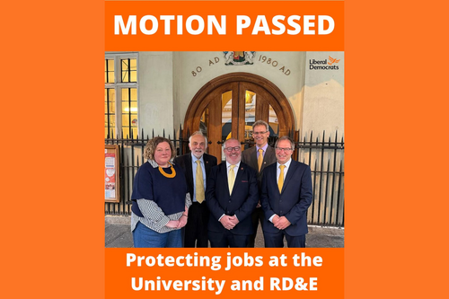 Motion Passed: Protecting Jobs at the University and RD&E. Exeter Lib Dems Cllrs in front of the Guildhall