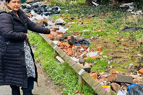 Aston Councillor Mumtaz Hussain pointing to a fly-tipping crisis in her ward