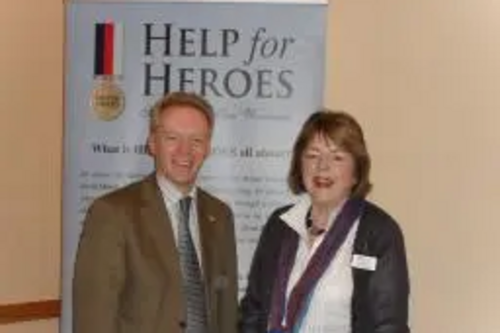 Stephen Robinson talking to the local fundraiser from Help for Heroes