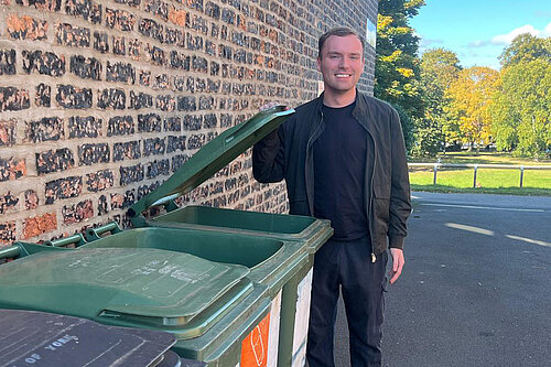 Luke Draper with bins