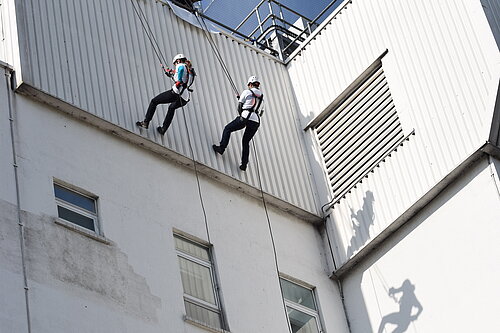 Bobby Dean MP abseils St Helier for charity