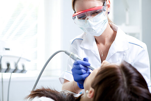A dentist carrying out a routine appointment 