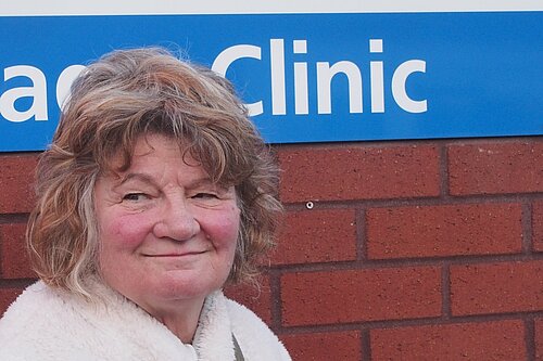 Morag outside clinic