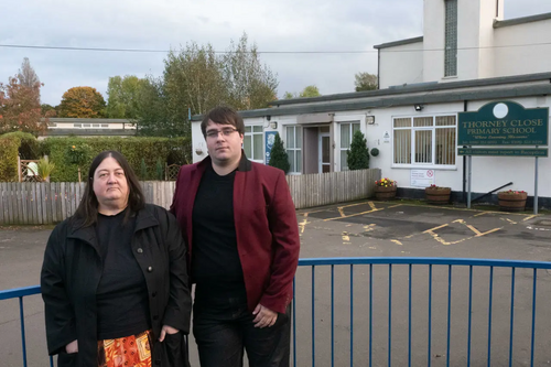 Councillor Margaret Crosby and Lib Dem campaigner Paul Edgeworth outside Thorney Close Primary School
