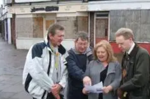 Graham Pooley, Jude Deakin, Robin Stevens and Stephen Robinson outside Kings Road shops