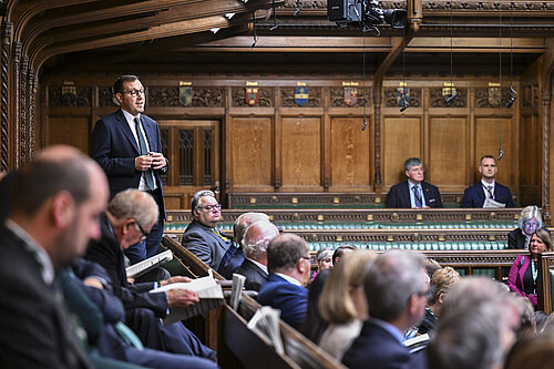 Tom Gordon stood speaking in the Chamber 