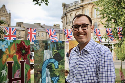 Tom stood in Harrogate with a smile on his face.