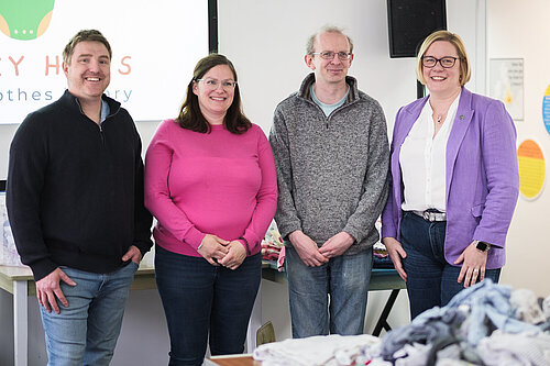 Zöe Franklin with members of Surrey Hills Baby Clothes Library team