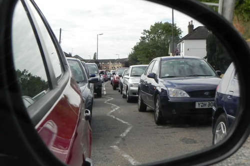 Graham Pooley traffic congestion viewed from wing mirror 