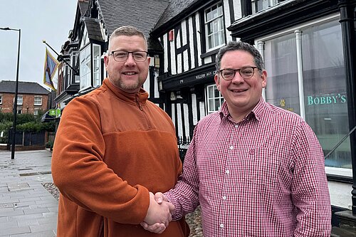 Cllr Thomas Janke shakes hands with David Ellams on Newport Hight Street