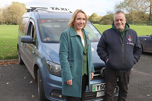 Helen Morgan with Basil and his taxi