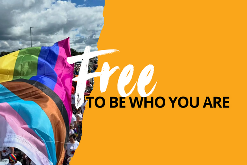A progress pride flag with the words Free To Be Who You Are