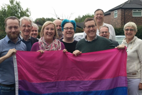 Campaigners holding the Bisexual flag