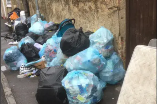 Fly-tipped rubbish bags